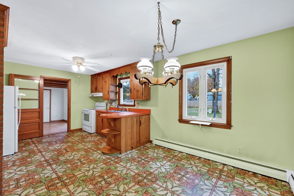 193 Marmon Street Springfield, MA 01129 - Photo 5 of 26 a view of a livingroom with furniture and window