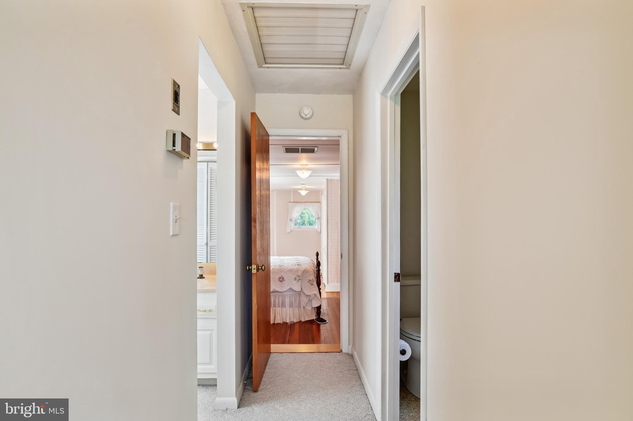 4475 Muddy Creek Road Harwood, MD 20776 - Photo 45 of 59 Carpeted Hallway to 3rd Bedroom