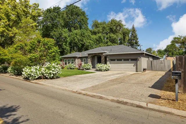 front view of a house with a patio