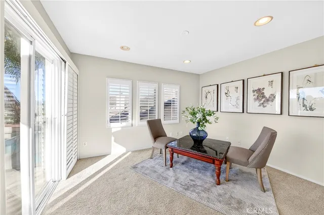 a room with furniture and window