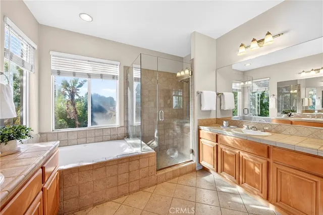 a view of a workspace with a table and chair in a room