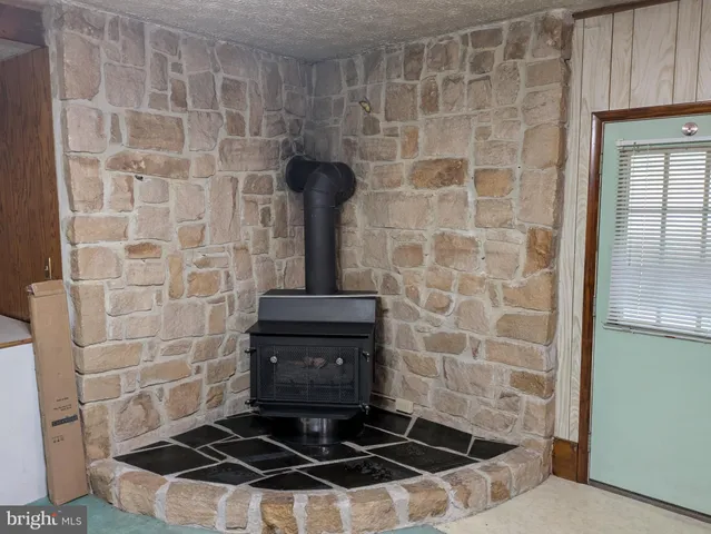 a bathroom with a shower and a sink