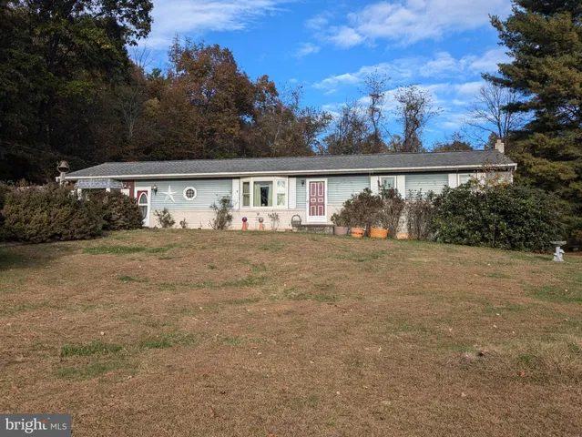 a front view of house with yard