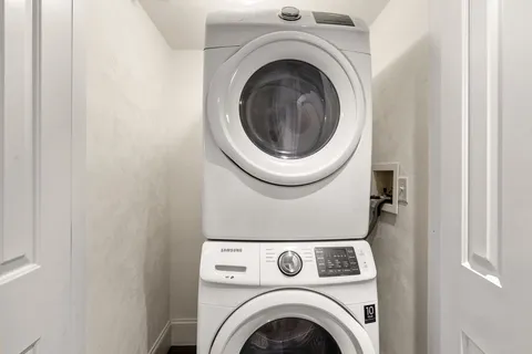 a view of entryway with washer and dryer