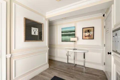 a view of a livingroom with table and chair