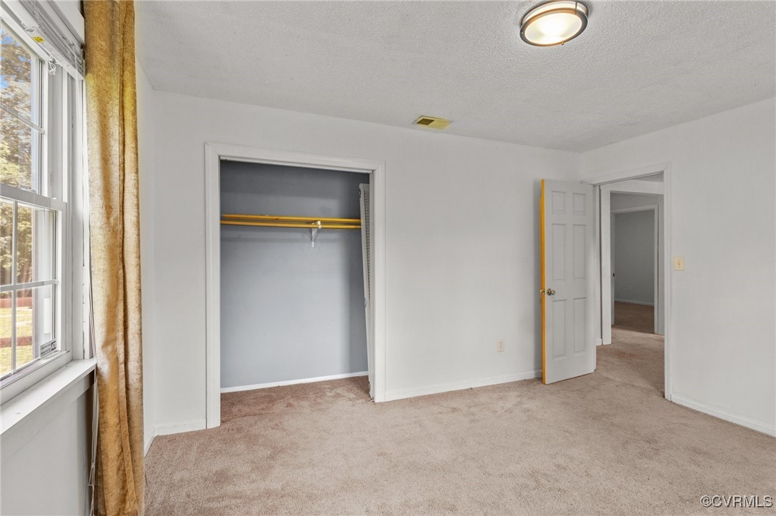 11021 Cosby Mill Road Quinton, VA 23141 - Photo 20 of 43 Unfurnished bedroom featuring carpet flooring, a t