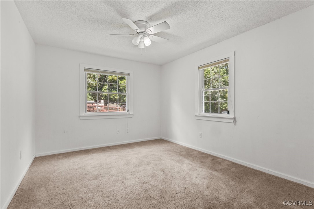 11021 Cosby Mill Road Quinton, VA 23141 - Photo 23 of 43 Carpeted spare room with a textured ceiling, ceili