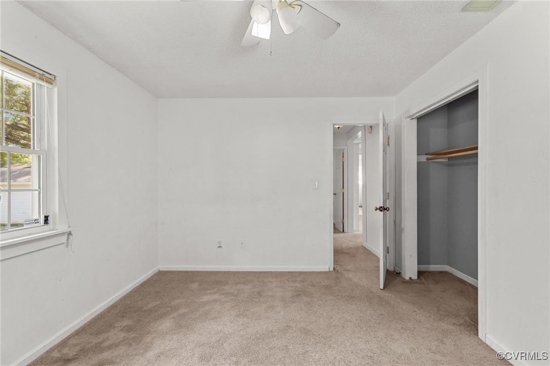 11021 Cosby Mill Road Quinton, VA 23141 - Photo 24 of 43 Unfurnished bedroom with light colored carpet, a c
