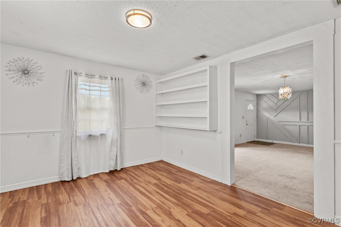 11021 Cosby Mill Road Quinton, VA 23141 - Photo 27 of 43 Empty room featuring a textured ceiling, carpet fl