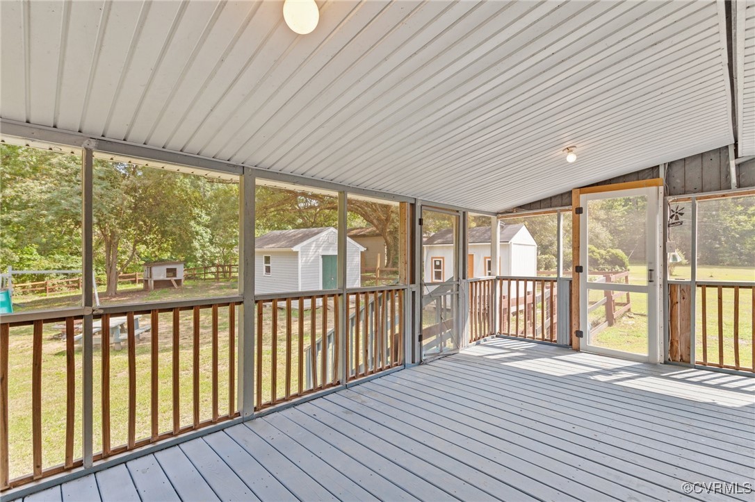11021 Cosby Mill Road Quinton, VA 23141 - Photo 33 of 43 Unfurnished sunroom with lofted ceiling