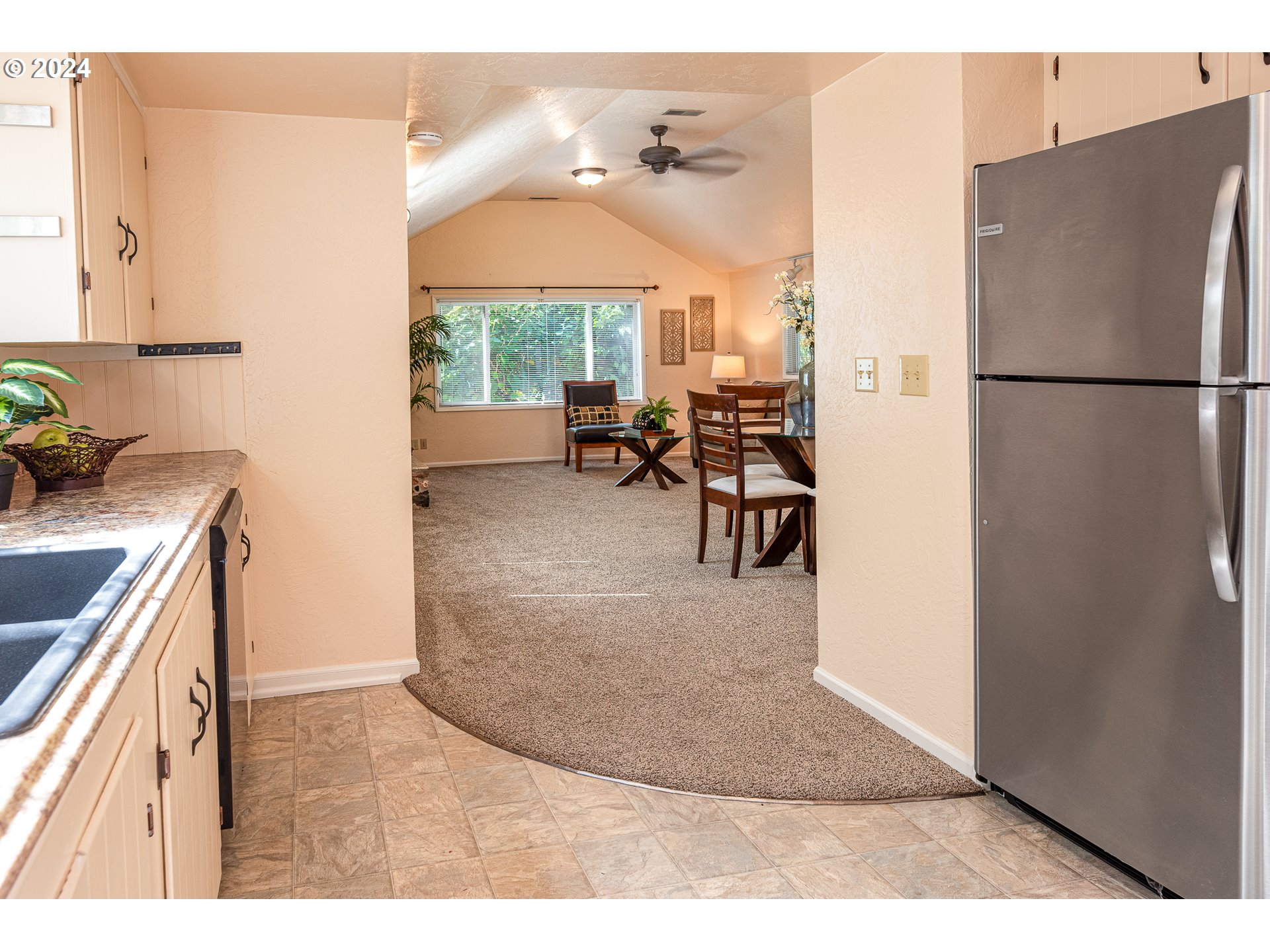 2875 Adams Street Eugene, OR 97405 - Photo 13 of 47 a view of a kitchen with furniture and a kitchen