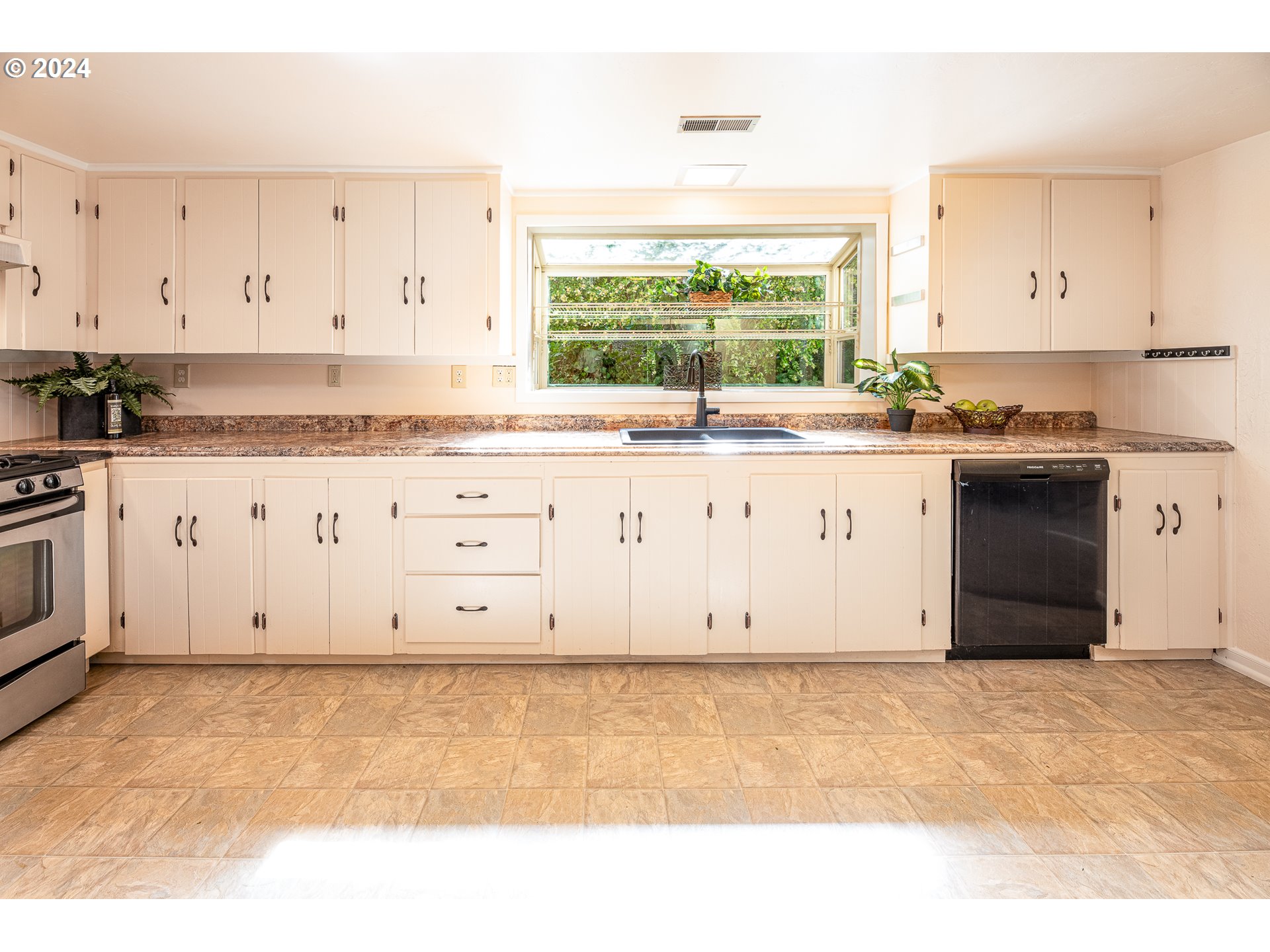 2875 Adams Street Eugene, OR 97405 - Photo 15 of 47 a view of kitchen with granite countertop cabinets and a sink