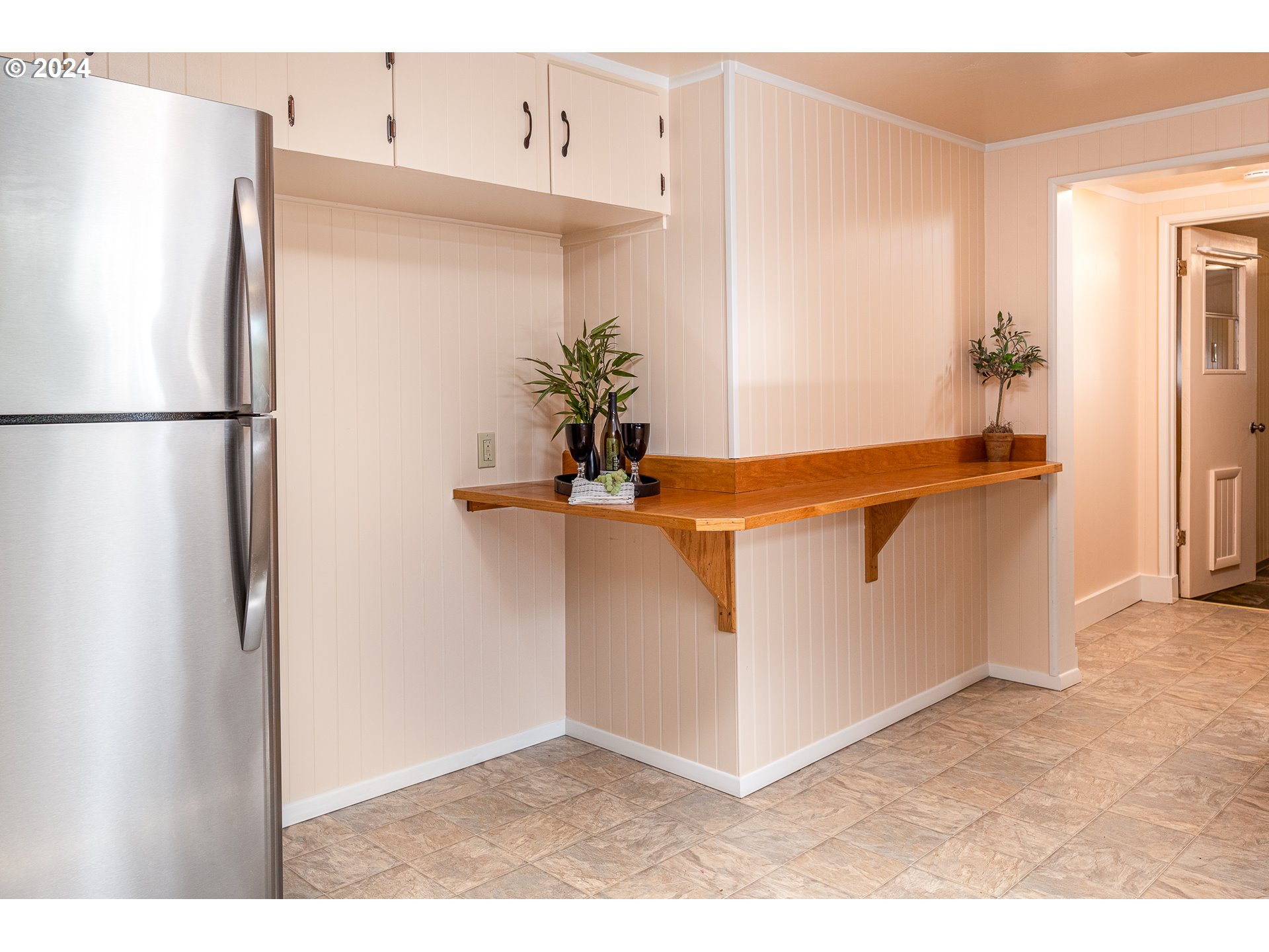 2875 Adams Street Eugene, OR 97405 - Photo 16 of 47 a view of kitchen with stainless steel appliances granite countertop refrigerator and cabinets