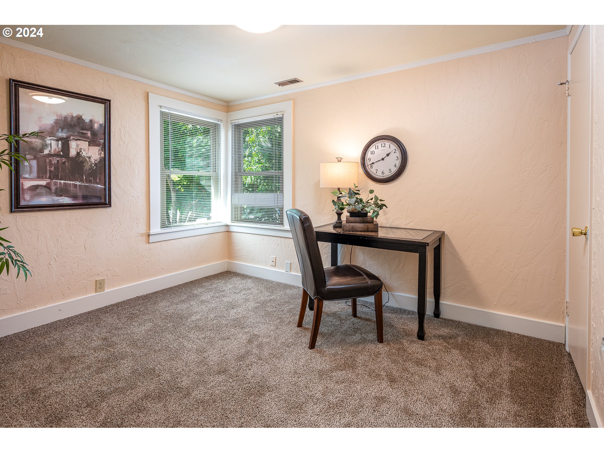 2875 Adams Street Eugene, OR 97405 - Photo 22 of 47 a view of workspace with wooden floor and windows