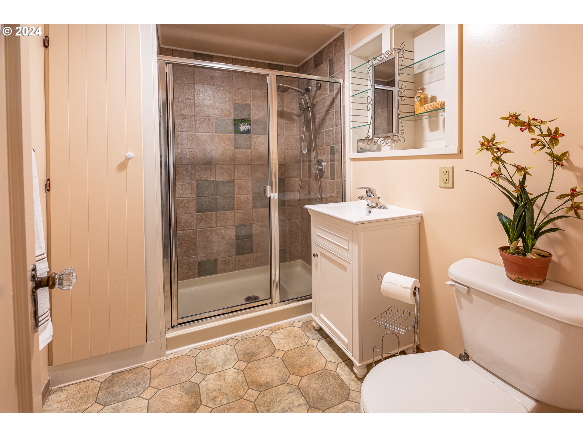 2875 Adams Street Eugene, OR 97405 - Photo 24 of 47 a bathroom with a sink toilet and shower