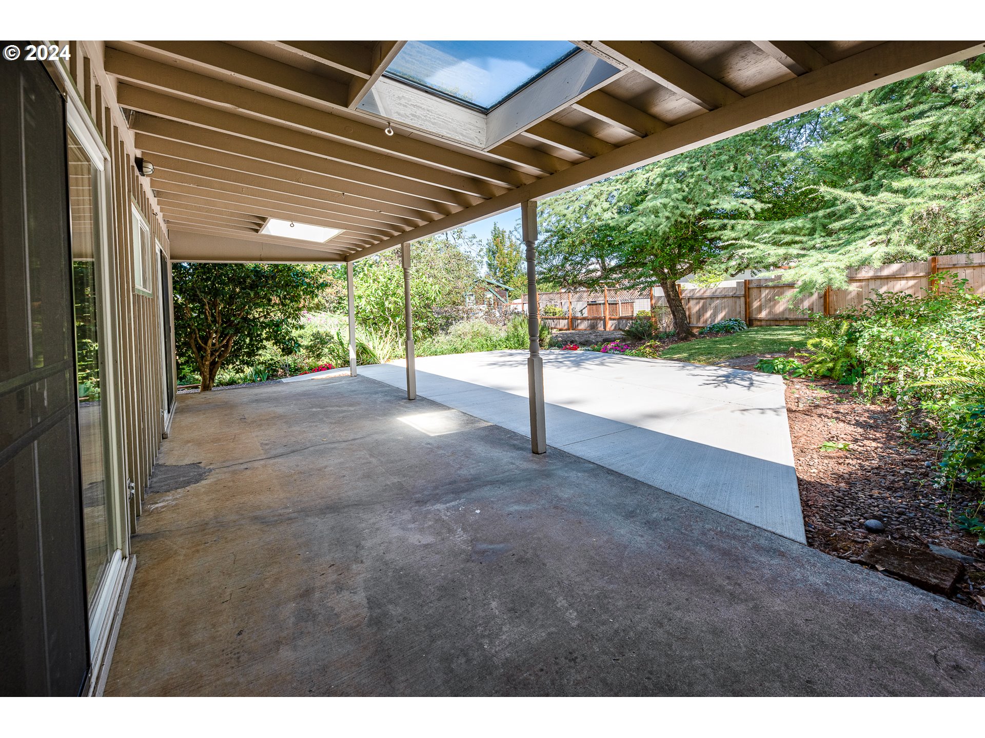 2875 Adams Street Eugene, OR 97405 - Photo 39 of 47 a view of a backyard with porch and outdoor space