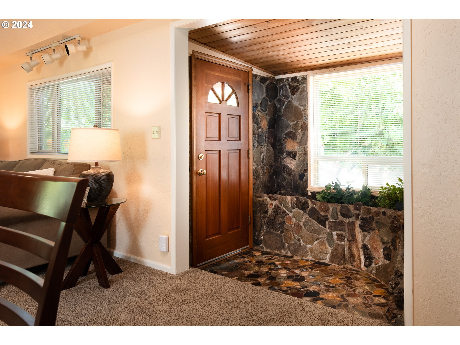 2875 Adams Street Eugene, OR 97405 - Photo 8 of 47 a view of a livingroom with furniture and windows