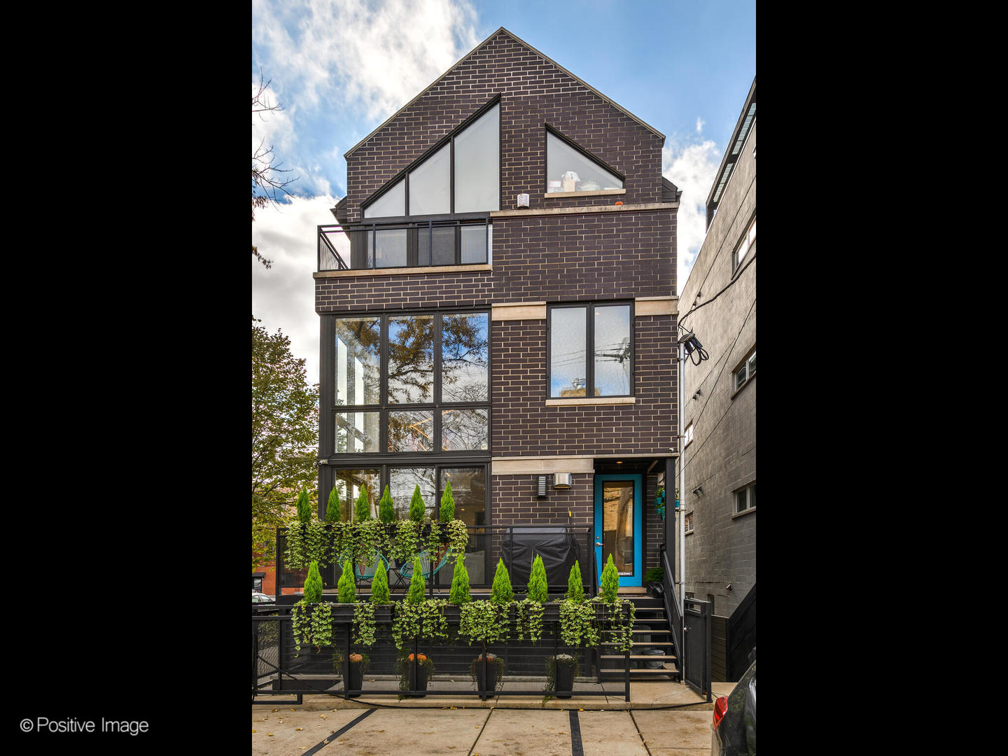 1934 West Armitage Avenue, Unit 2 Chicago, IL 60622 - Photo 1 of 33 a front view of a house with garden