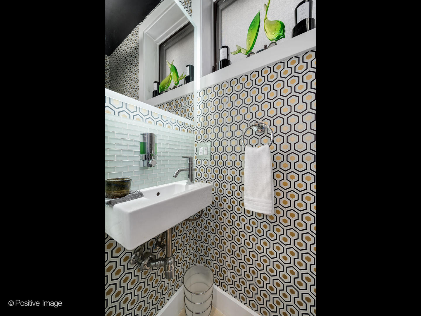1934 West Armitage Avenue, Unit 2 Chicago, IL 60622 - Photo 14 of 33 a bathroom with a sink a mirror and shower