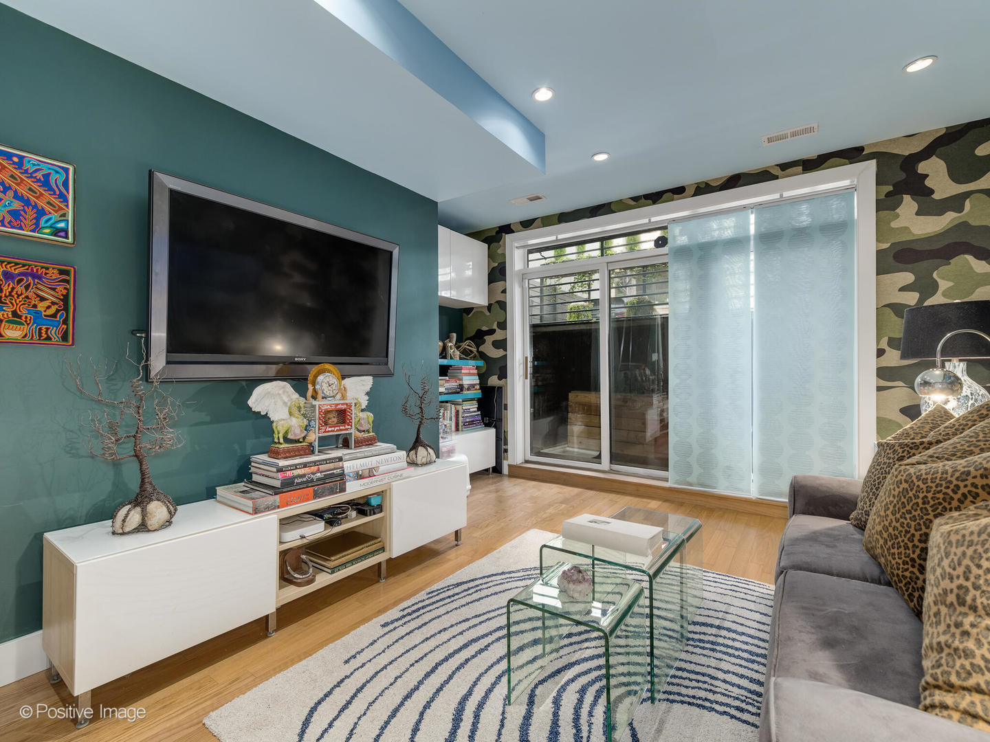 1934 West Armitage Avenue, Unit 2 Chicago, IL 60622 - Photo 21 of 33 a living room with furniture and a flat screen tv