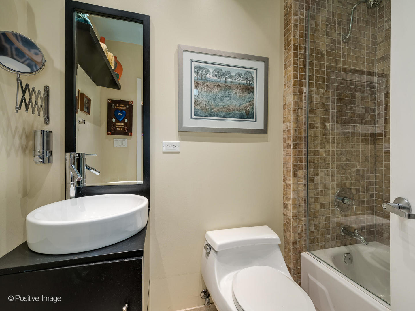 1934 West Armitage Avenue, Unit 2 Chicago, IL 60622 - Photo 22 of 33 a bathroom with a toilet a sink and mirror