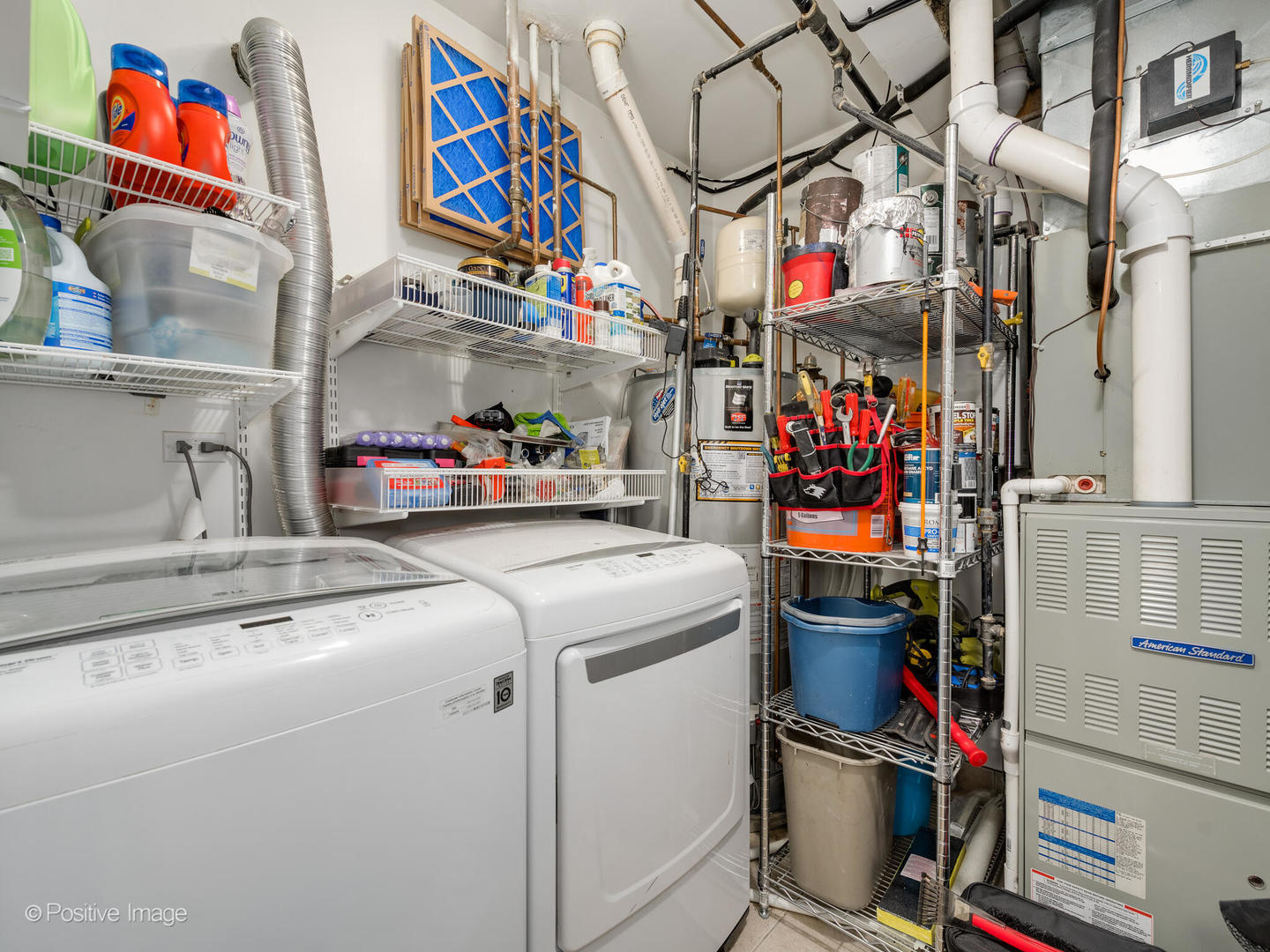 1934 West Armitage Avenue, Unit 2 Chicago, IL 60622 - Photo 24 of 33 a utility room with dryer and washer