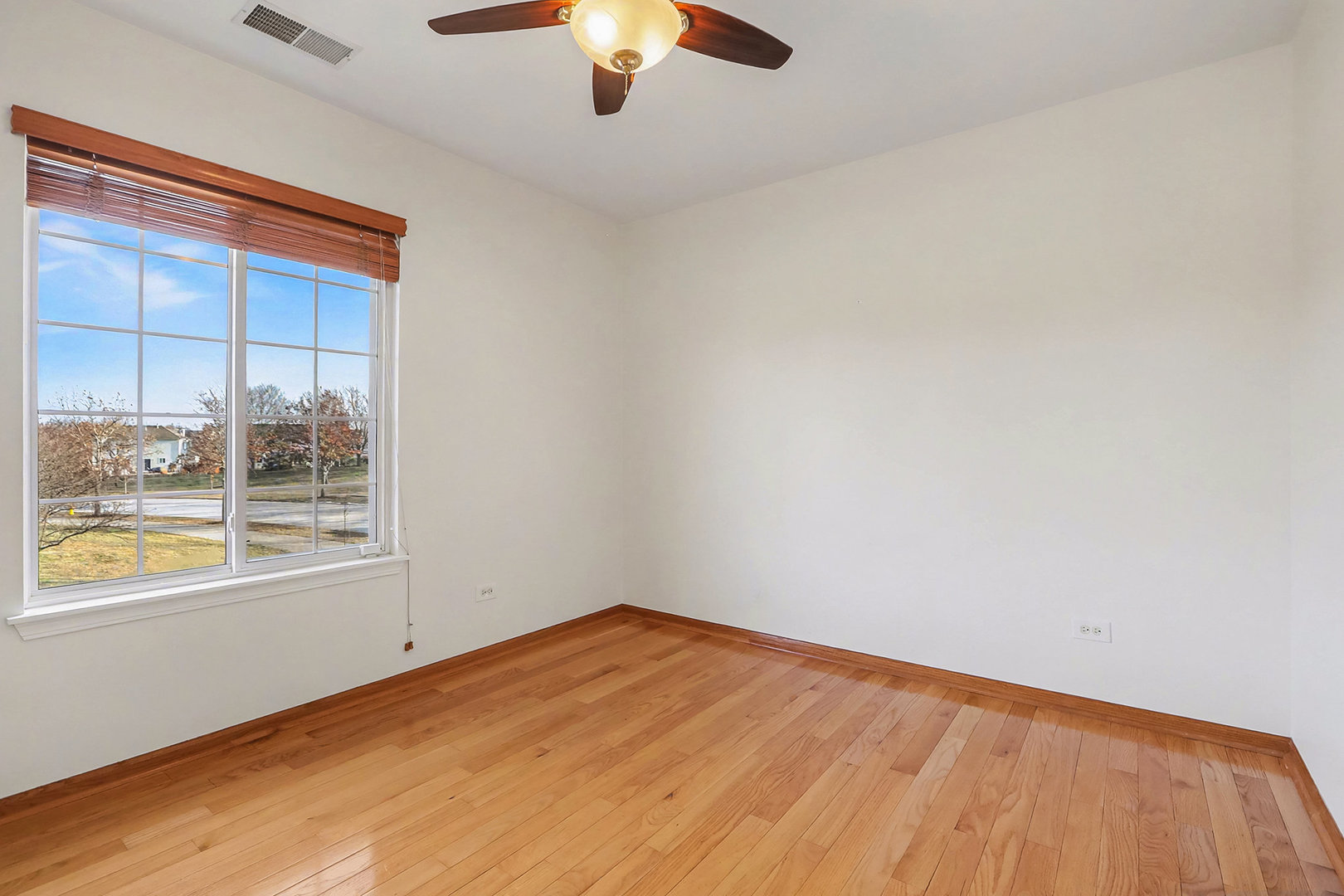 1576 Marigold Lane Minooka, IL 60447 - Photo 17 of 25 an empty room with a window