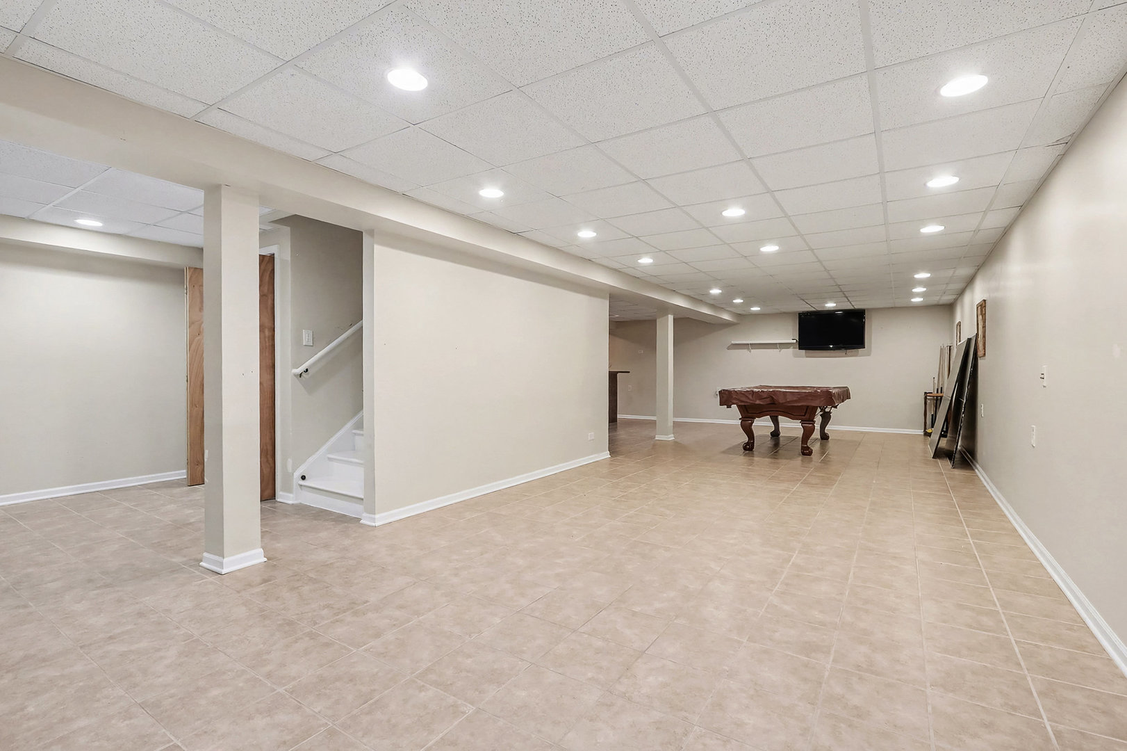 1576 Marigold Lane Minooka, IL 60447 - Photo 20 of 25 an empty room with wooden floor and furniture