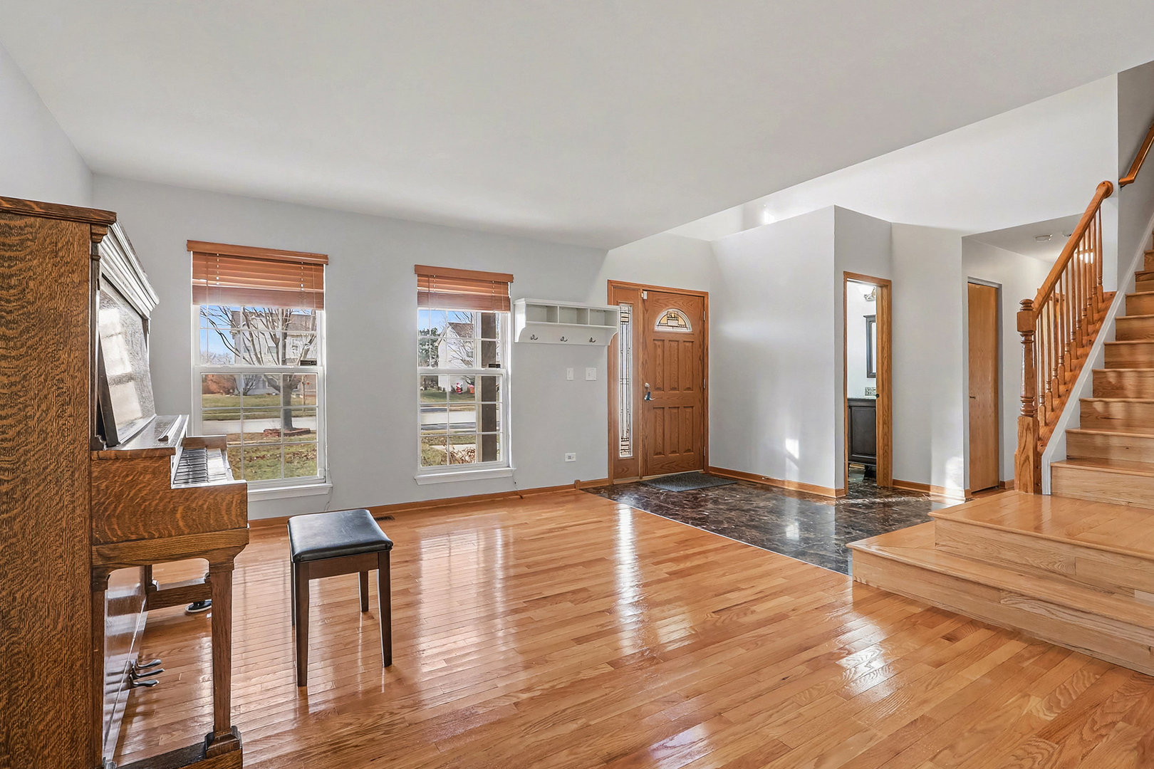 1576 Marigold Lane Minooka, IL 60447 - Photo 3 of 25 a view of a living room with furniture and wooden floor