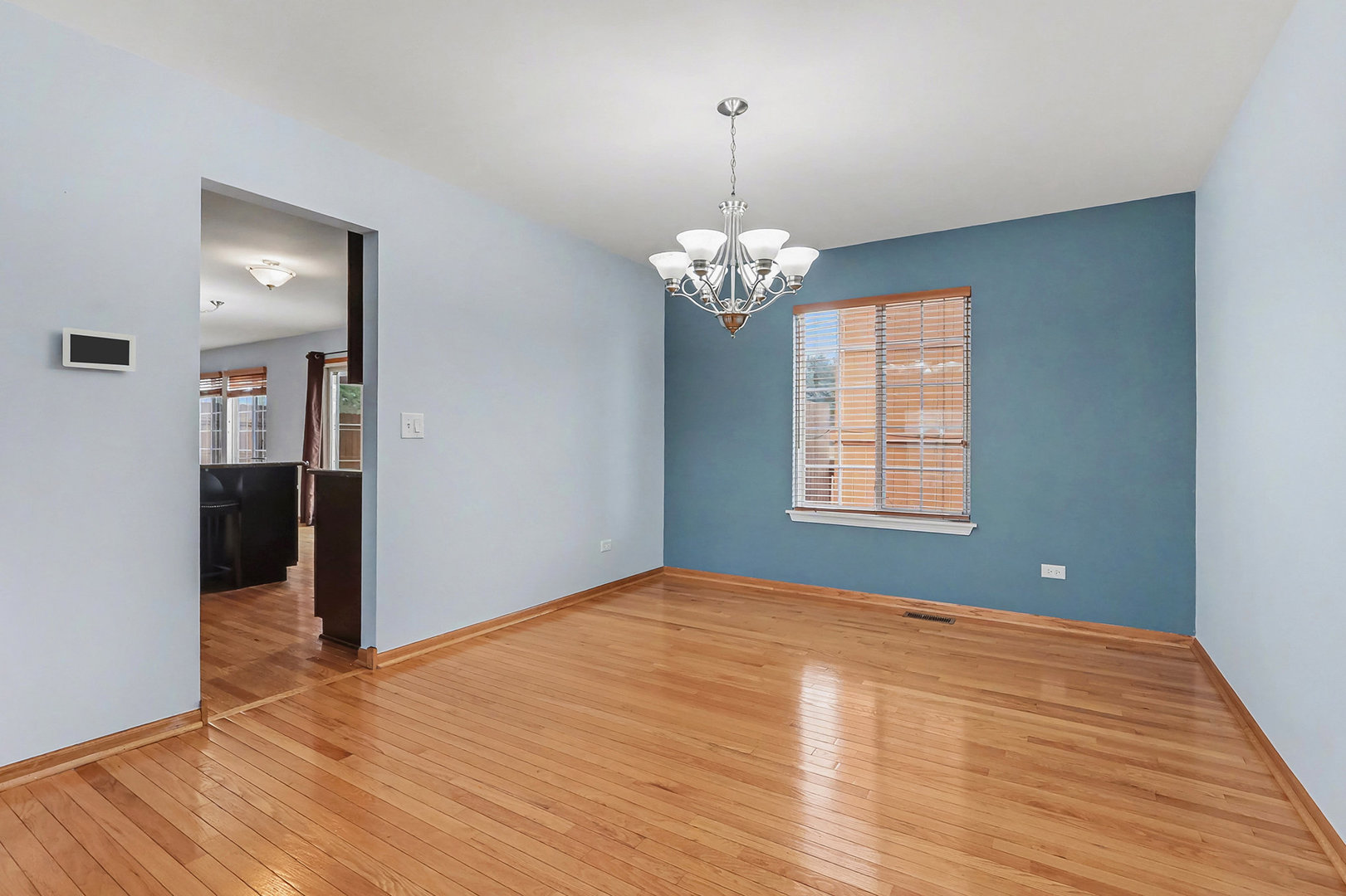1576 Marigold Lane Minooka, IL 60447 - Photo 5 of 25 a view of empty room with wooden floor