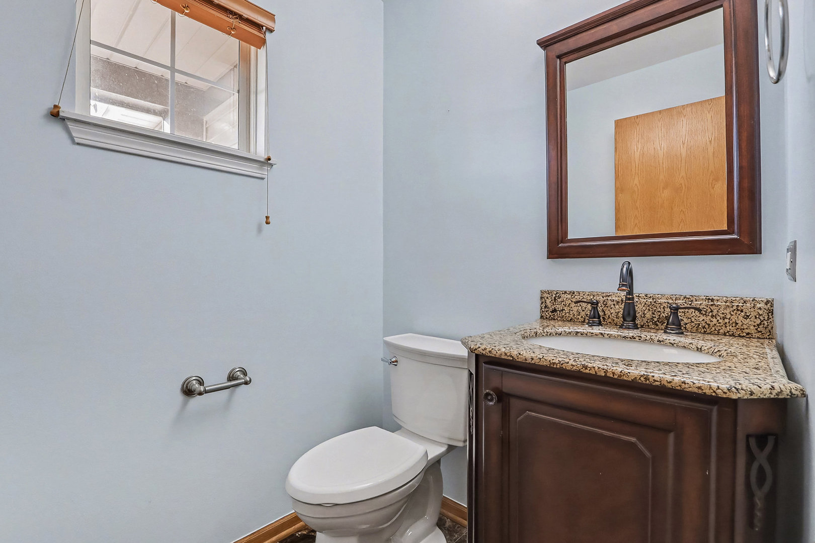 1576 Marigold Lane Minooka, IL 60447 - Photo 10 of 25 a bathroom with a toilet a sink and mirror