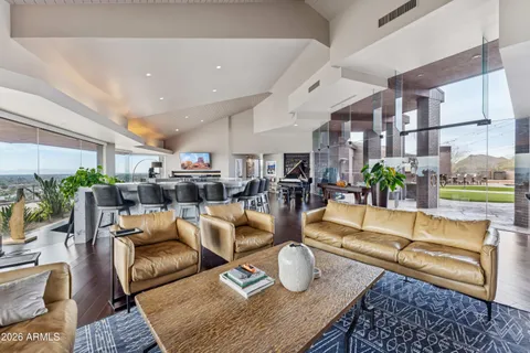 a kitchen with kitchen island granite countertop lots of counter top space and appliances