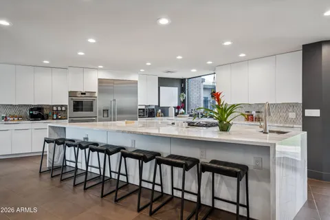 a kitchen with a washer and dryer