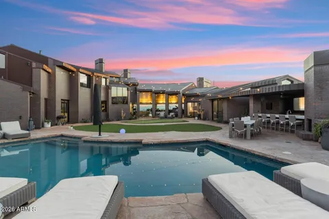 a front view of a house with backyard