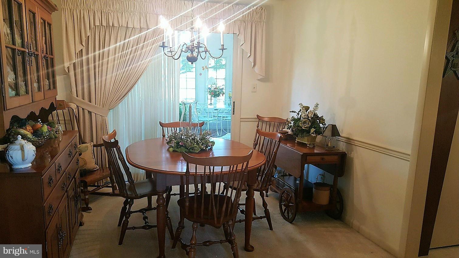 13026 Blairs Valley Road Clear Spring, MD 21722 - Photo 12 of 30 a view of a dining room with furniture and wooden floor