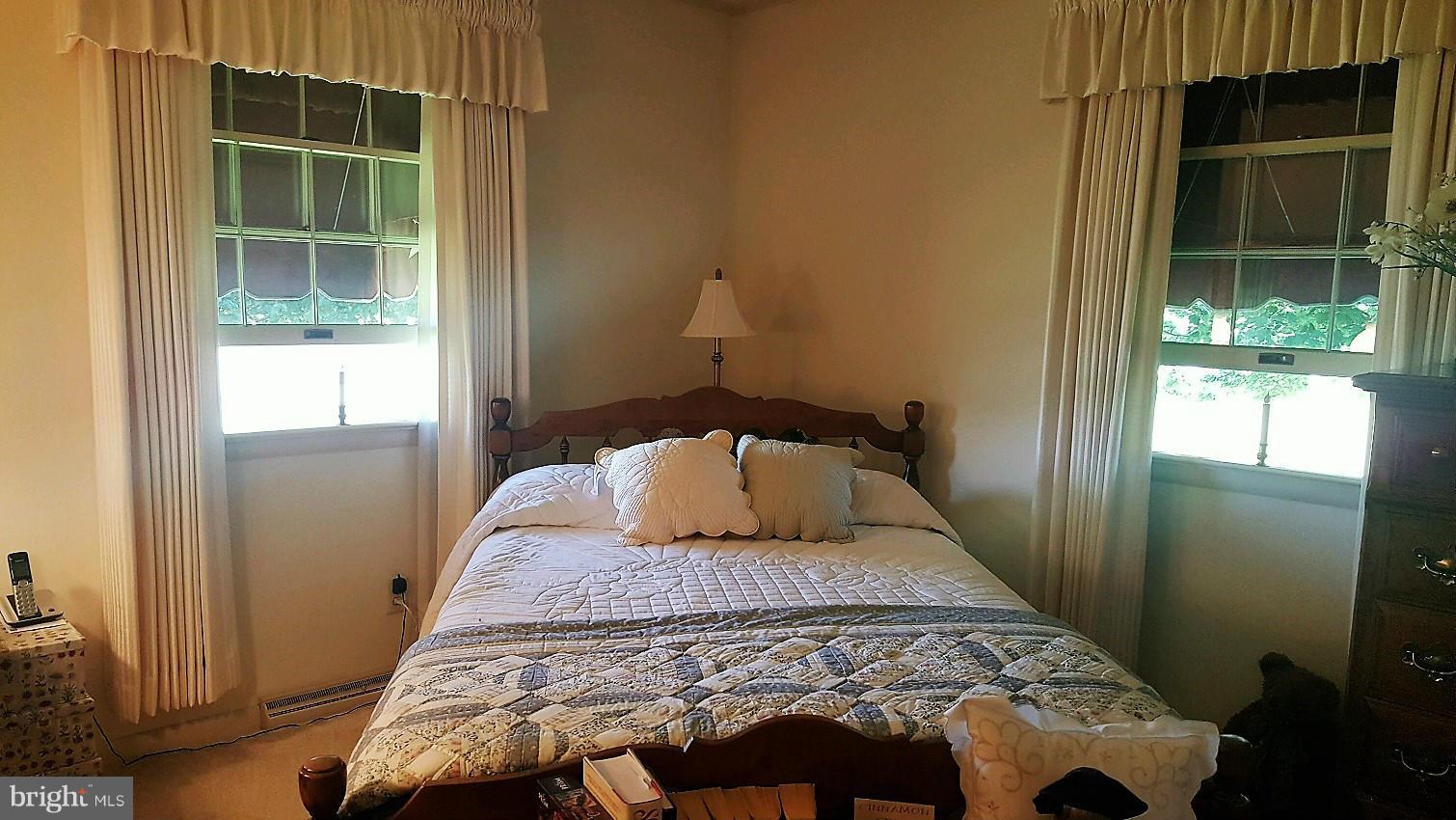 13026 Blairs Valley Road Clear Spring, MD 21722 - Photo 19 of 30 a bedroom with a bed and a window