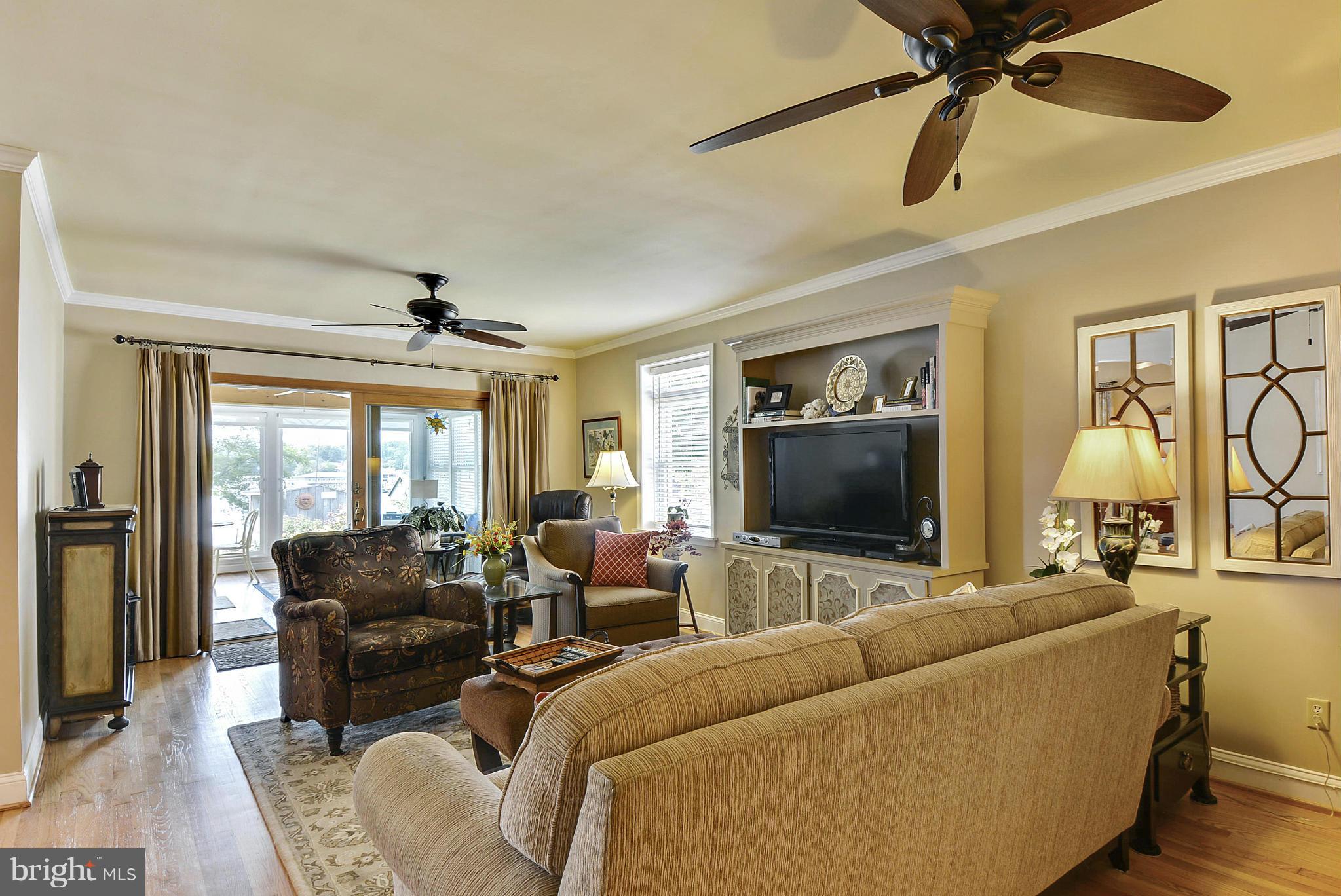 8 Granada Road Pasadena, MD 21122 - Photo 11 of 30 a living room with furniture and a flat screen tv