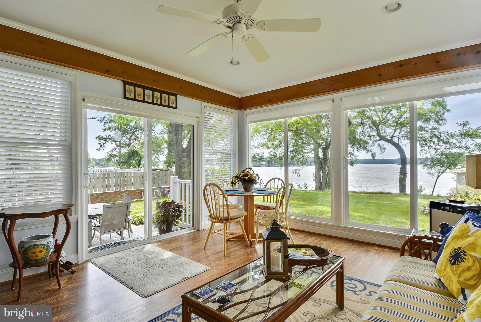8 Granada Road Pasadena, MD 21122 - Photo 12 of 30 a living room with furniture and a large window with garden view