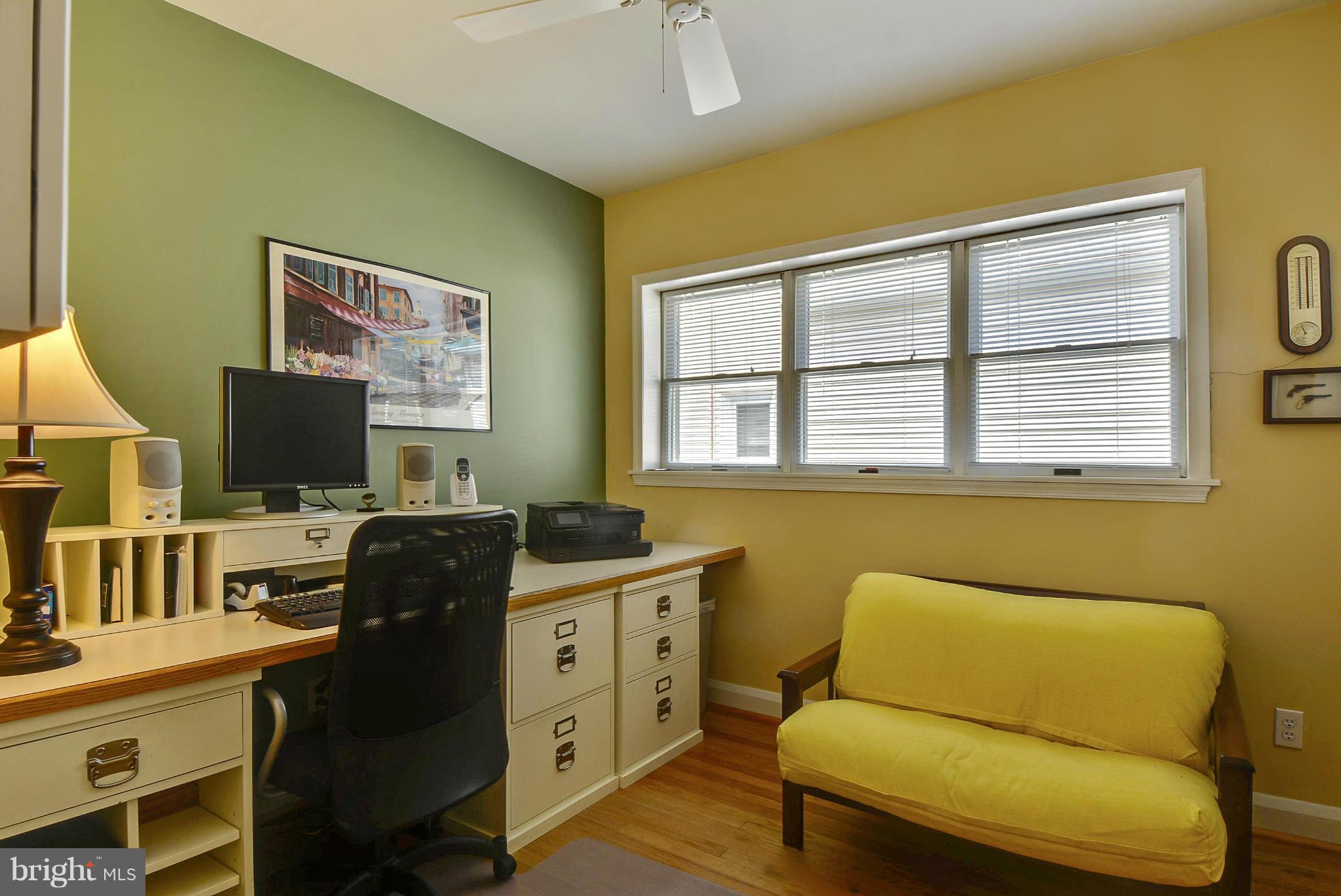 8 Granada Road Pasadena, MD 21122 - Photo 14 of 30 a livingroom with workspace and a couch
