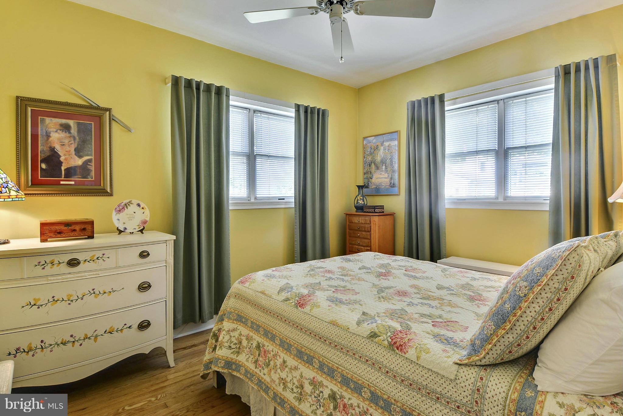 8 Granada Road Pasadena, MD 21122 - Photo 15 of 30 a bedroom with a bed and a dresser