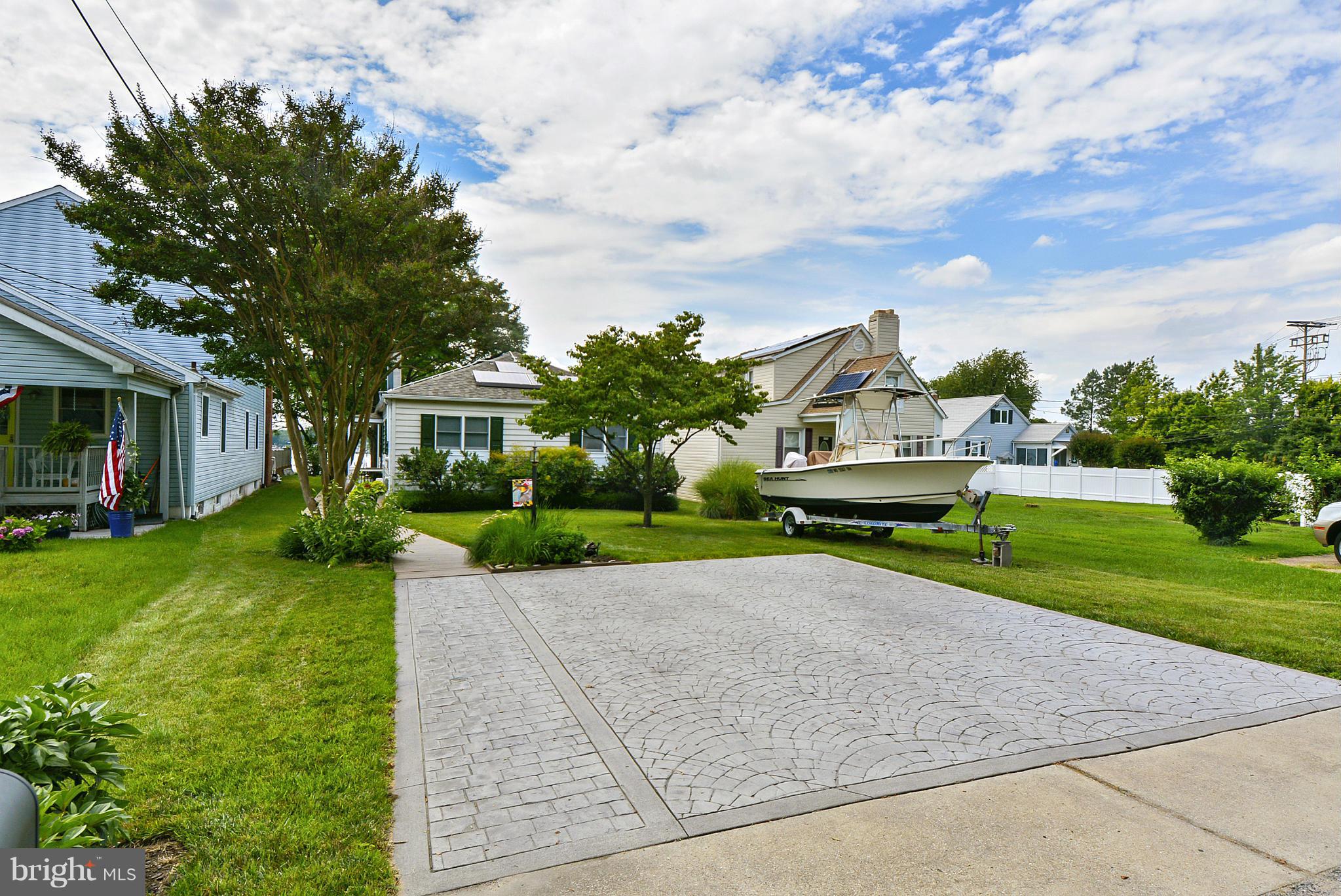 8 Granada Road Pasadena, MD 21122 - Photo 18 of 30 a front view of house with yard and green space