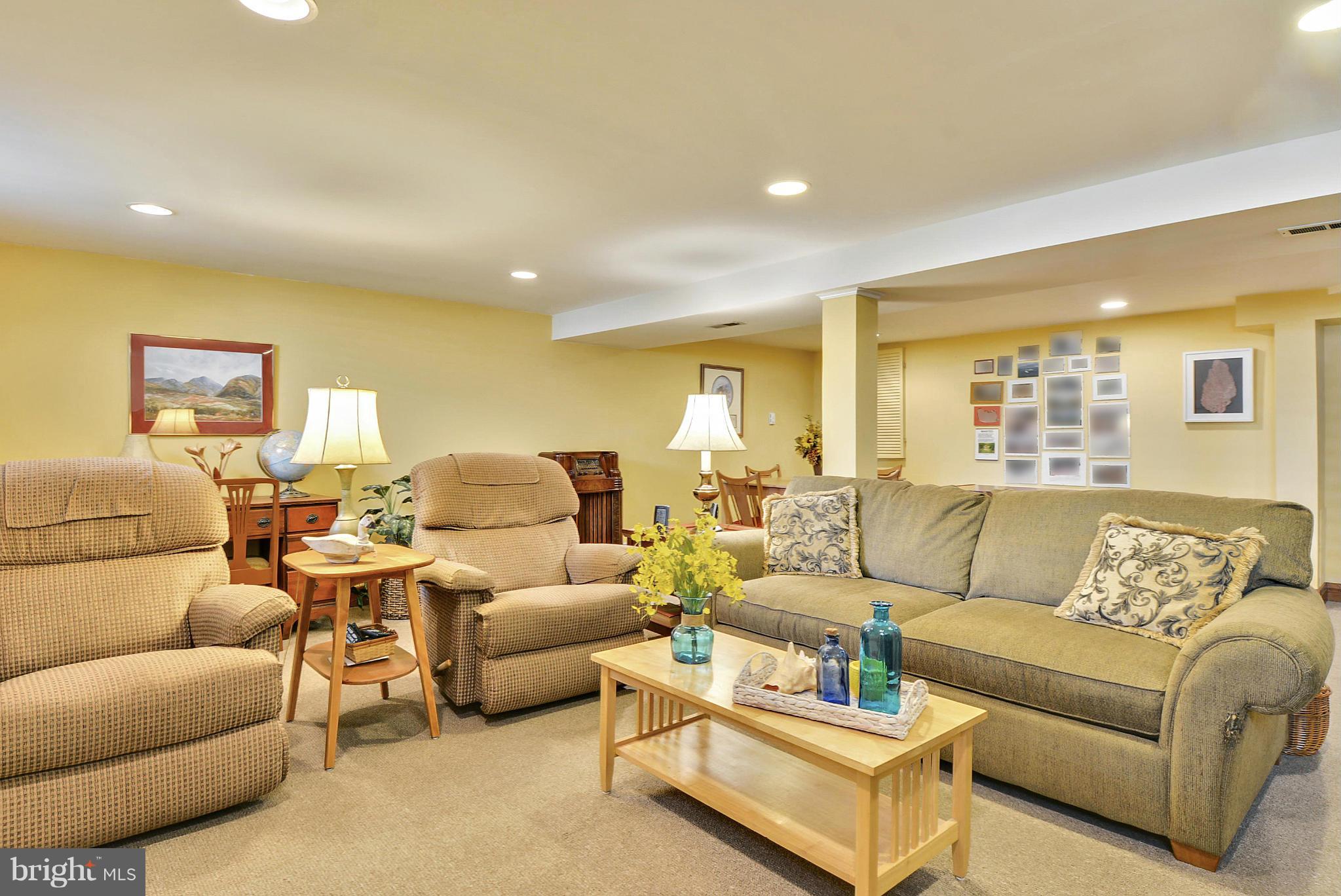 8 Granada Road Pasadena, MD 21122 - Photo 19 of 30 a living room with furniture and a large window