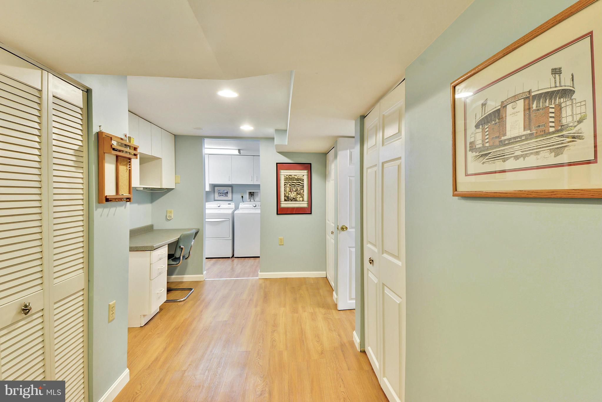 8 Granada Road Pasadena, MD 21122 - Photo 22 of 30 a view of a hallway with wooden floor and a living room