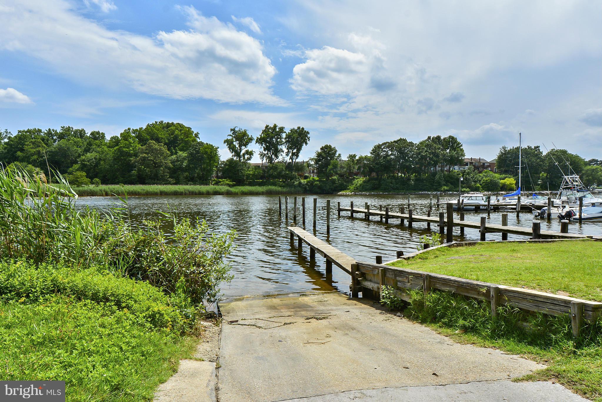 8 Granada Road Pasadena, MD 21122 - Photo 26 of 30 a view of a lake with houses in the back