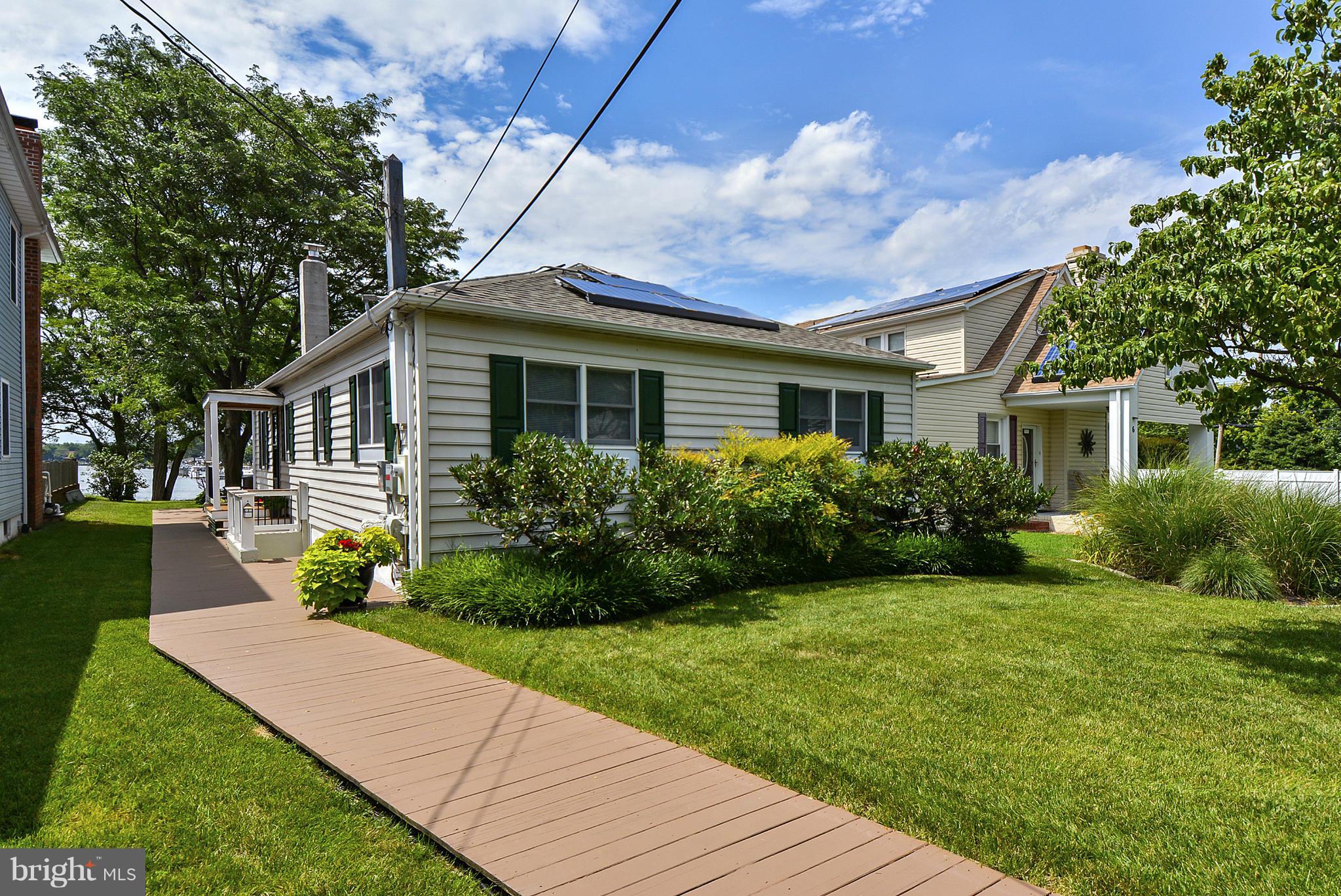 8 Granada Road Pasadena, MD 21122 - Photo 6 of 30 a view of a house with backyard and garden