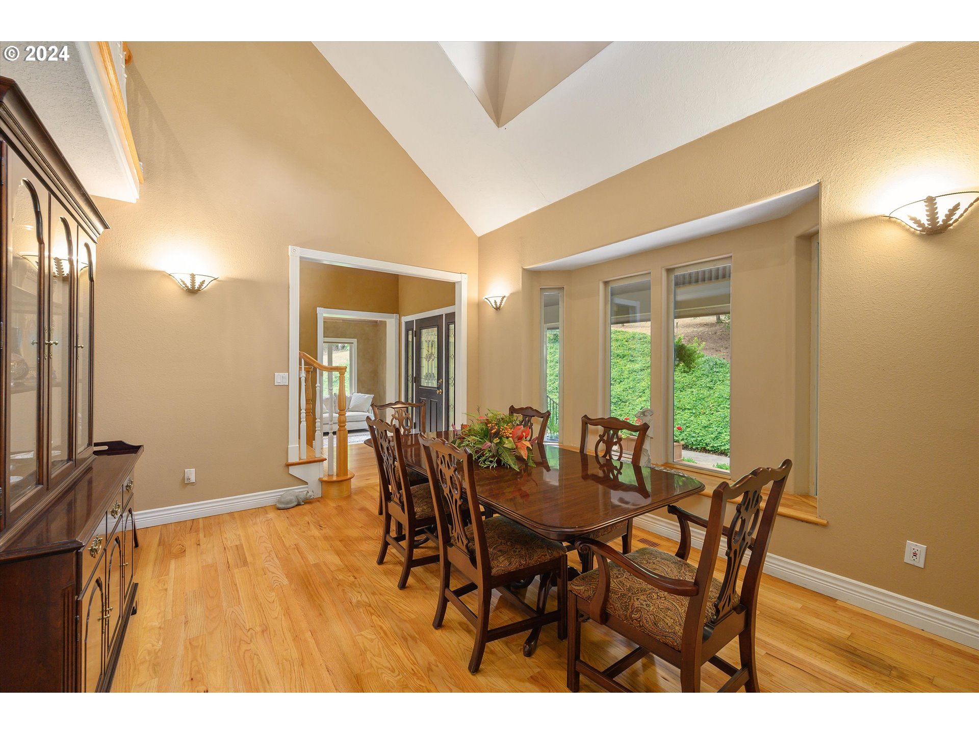 900 James Howe Road Dallas, OR 97338 - Photo 17 of 40 a view of a dining room with furniture and wooden floor