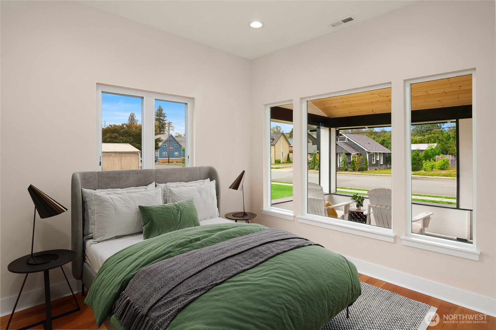 306 3rd Street Sultan, WA 98294 - Photo 13 of 40 a bedroom with a large bed and a large window