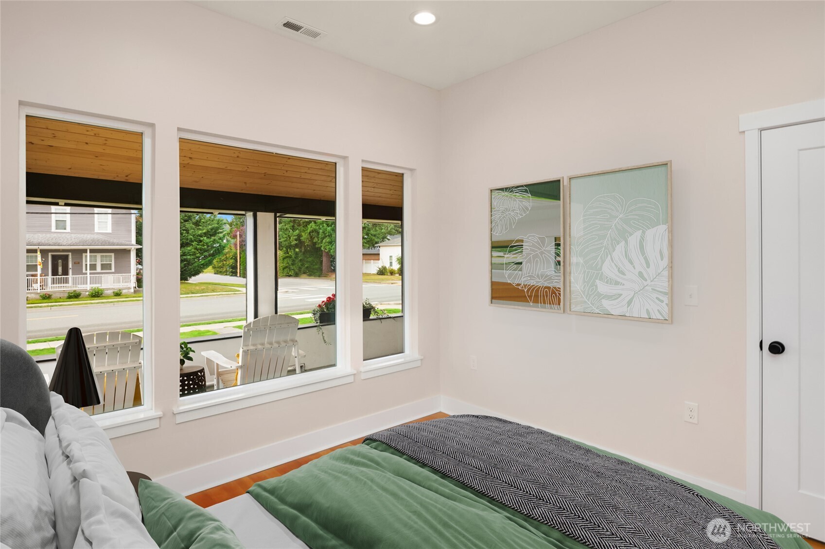 306 3rd Street Sultan, WA 98294 - Photo 14 of 40 a bedroom with a bed and glass window