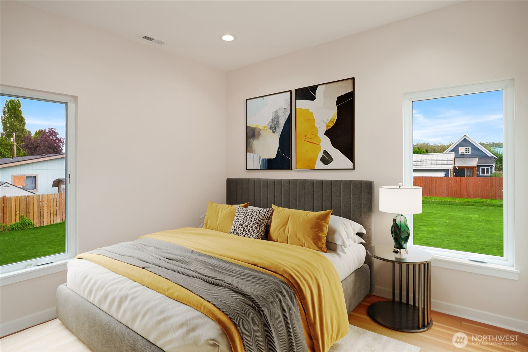 306 3rd Street Sultan, WA 98294 - Photo 16 of 40 a bedroom with a bed and painting on the wall