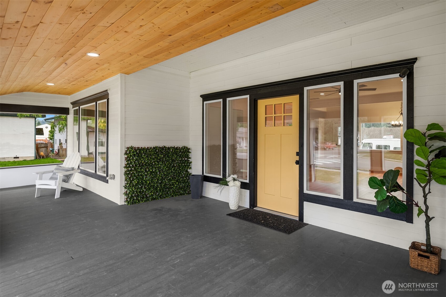 306 3rd Street Sultan, WA 98294 - Photo 2 of 40 a living room with a large window and walk in closet